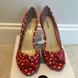 Call it Spring short heel. Red shoe with white polka dots